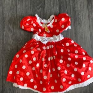 From Downtown Disney Store. Minnie white polka dot red dress